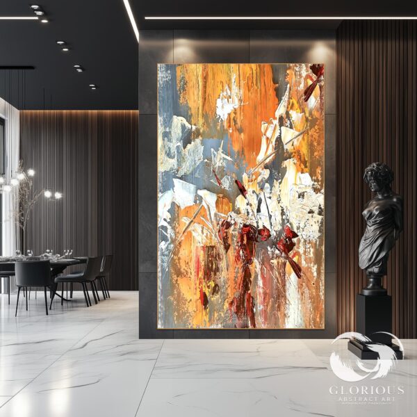 Abstract canvas art with orange and gray tones, featuring textured brushstrokes.