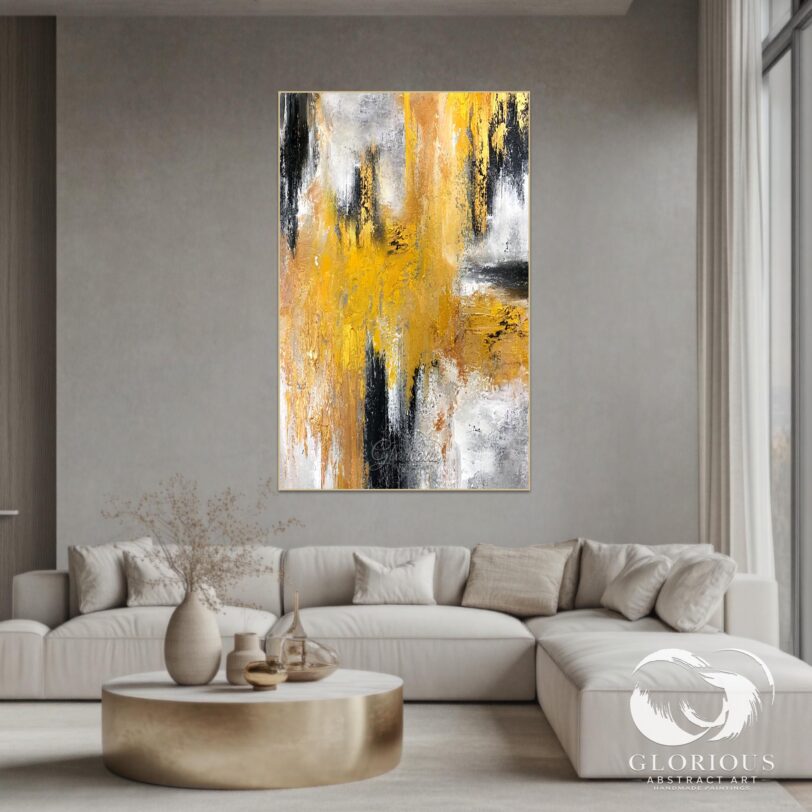Close-up view of textured brushstrokes on a yellow and black abstract painting.