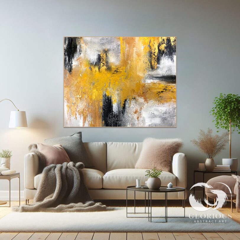 Yellow abstract painting styled in a minimalist home office with wooden furniture
