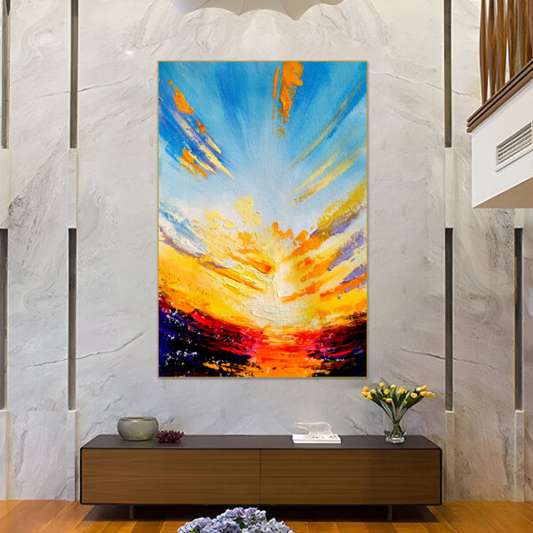 Textured artwork showing vivid blue and orange sunset colors