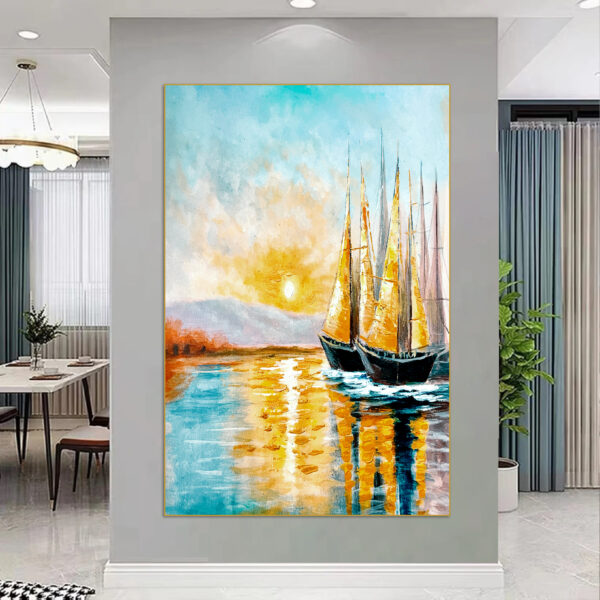 Coastal canvas art featuring golden sky and sailboats