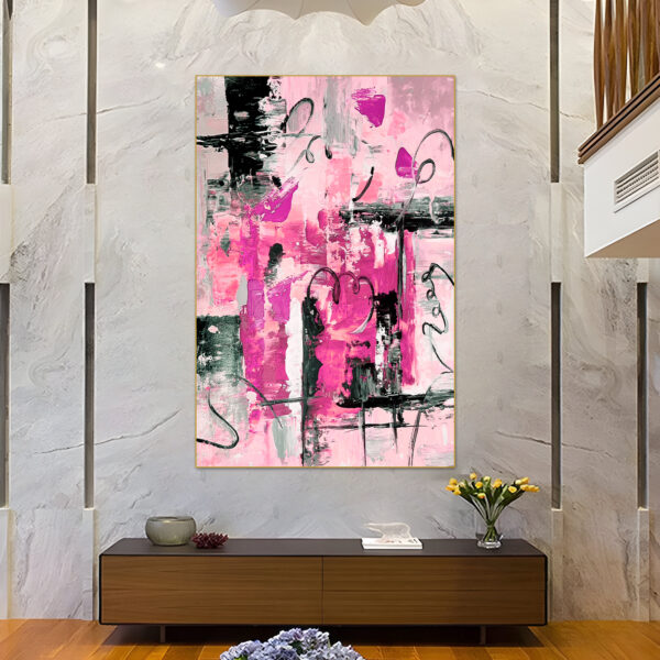 Oversized pink canvas with dynamic black elements