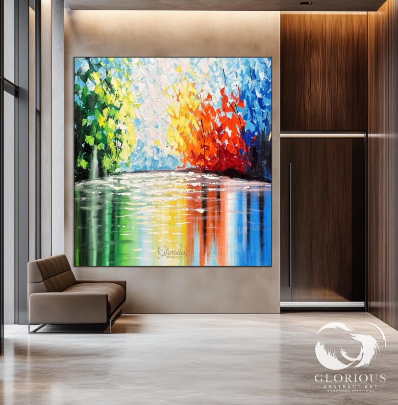 Abstract painting with colorful reflections displayed on a white wall