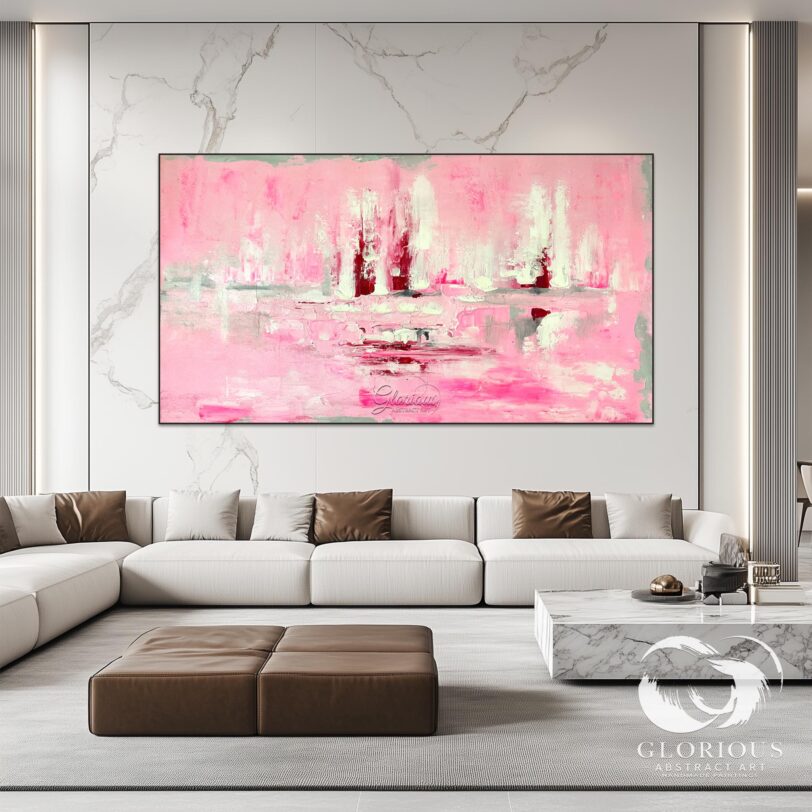 Side view of textured brushstrokes on a pink and white abstract painting.