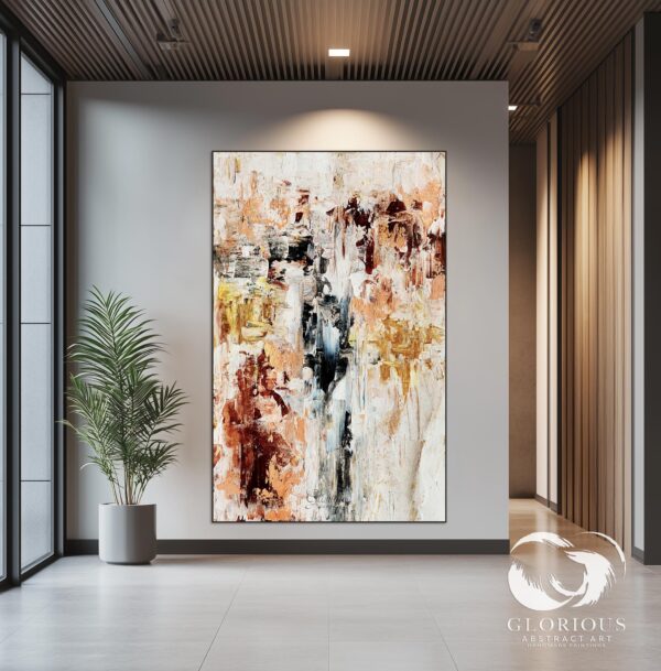 Neutral abstract canvas with textured beige and gold tones styled with indoor plants and modern furniture