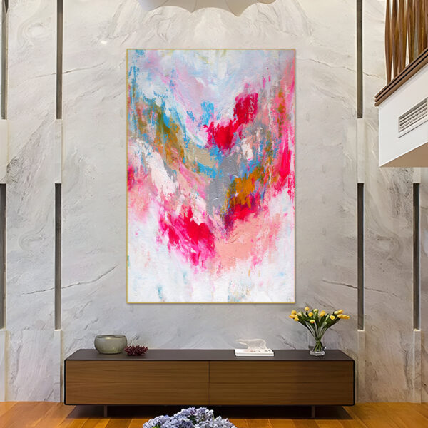 Vibrant pink abstract canvas art with blue accents