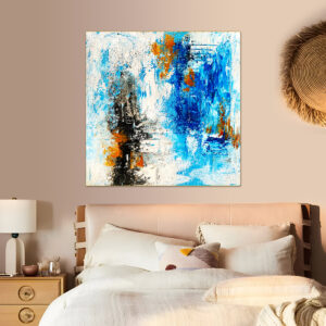 Large abstract canvas art with a mix of blue, white, black, and orange colors in a modern style.