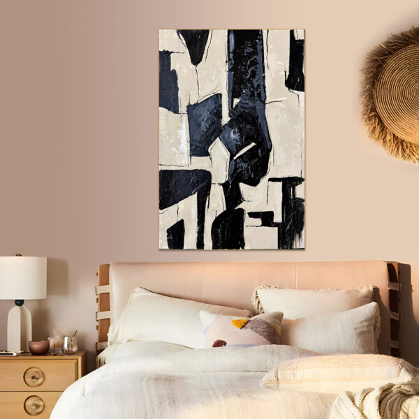 Hand-painted with bold brushstrokes, this modern abstract wall art in black and beige adds sophistication to any living room.