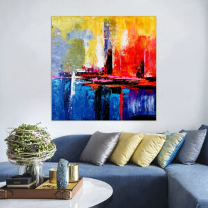 Large abstract painting with colorful red, blue, and yellow brushstrokes for living room decor.