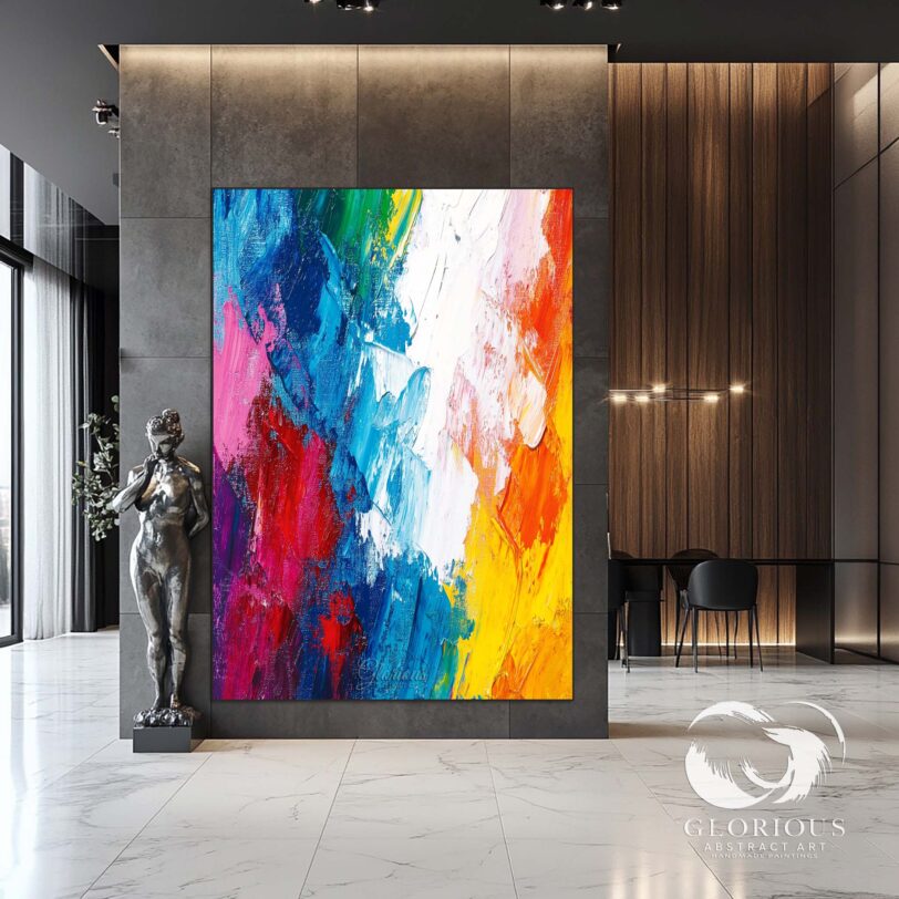 Multicolor abstract artwork featuring blue, red, and yellow, adding vibrancy to a contemporary space.