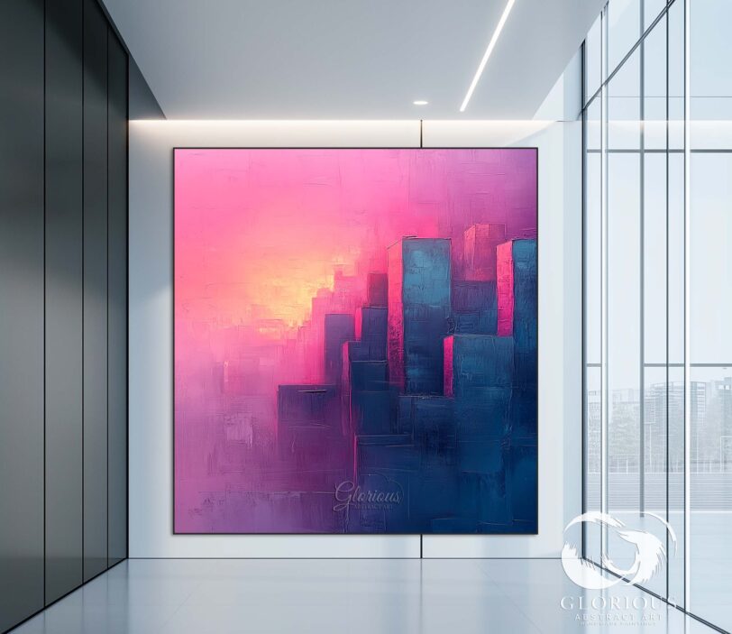 Abstract cityscape painting in pink and blue, hanging in a stylish modern office.