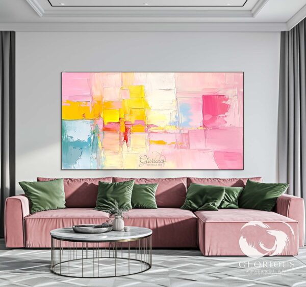 Large modern abstract painting in pink, yellow, and blue tones, displayed in a home office setting.