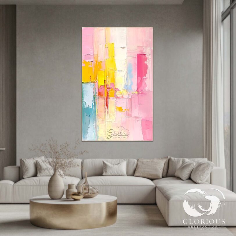 Large abstract painting with a pink and yellow color palette, displayed in a modern living room.