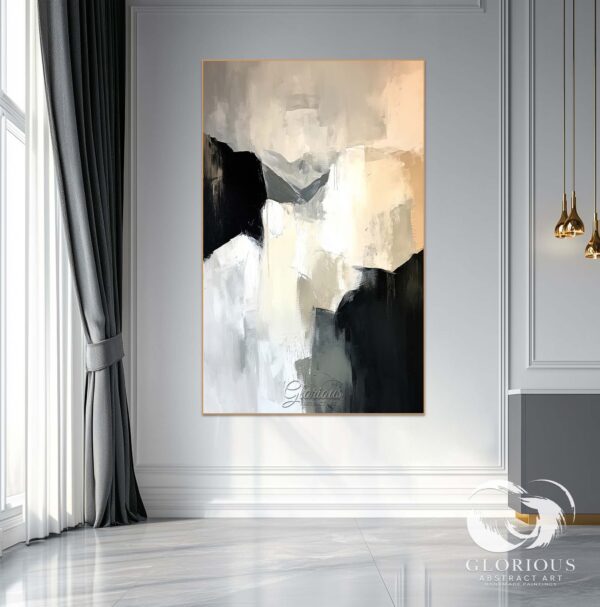 Abstract black and white canvas painting in a minimalist hallway