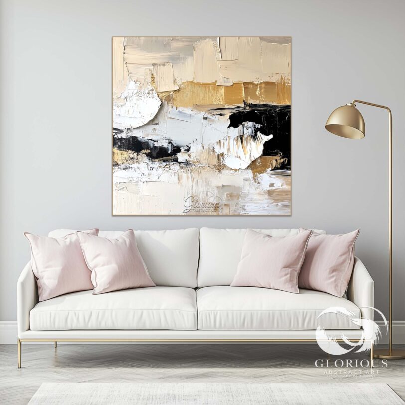 Close-up of textured beige, black, and gold abstract painting on canvas