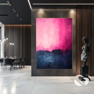 Side view of a pink and navy abstract canvas with layered textures.