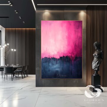 Side view of a pink and navy abstract canvas with layered textures.