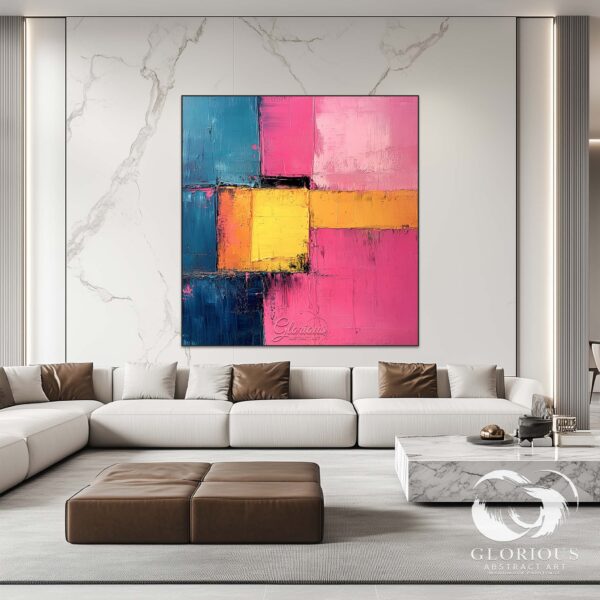 Large abstract painting in vibrant pink, yellow, and blue colors on a textured canvas.