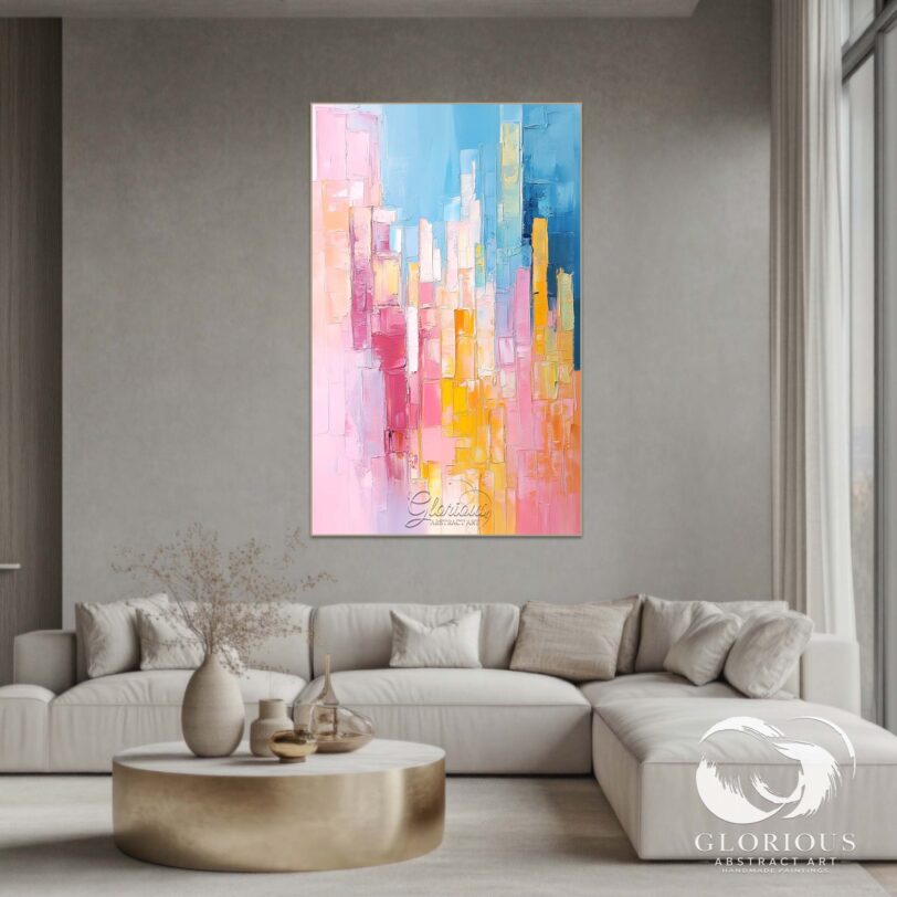 Large abstract cityscape painting above a light blue sofa in modern living room.