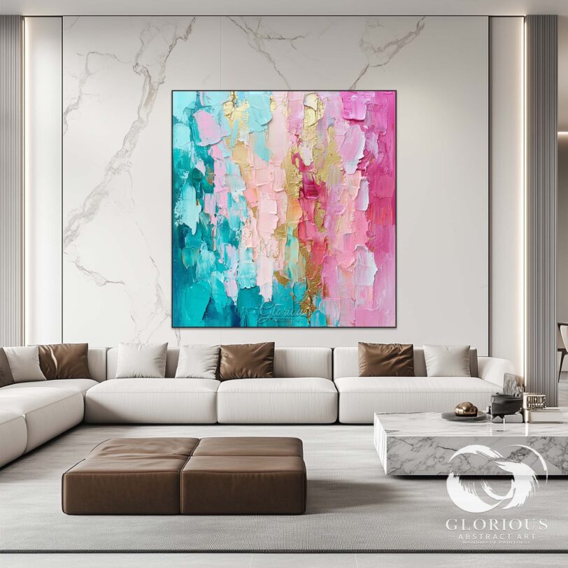 Side view of a textured abstract painting in turquoise, pink, and gold.