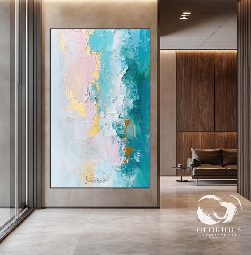 Detail shot of soft pink and blue tones blending into shimmering gold in an abstract painting.