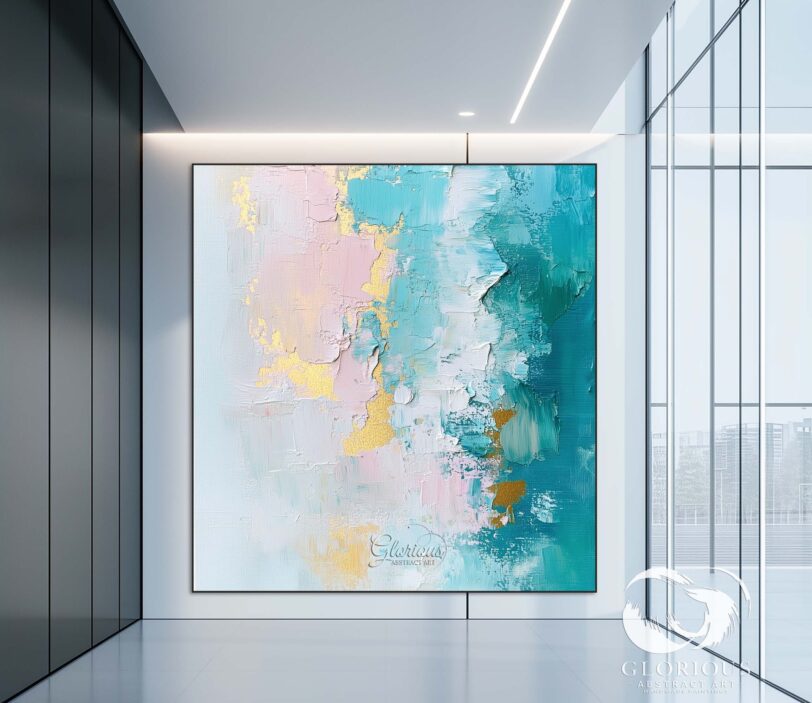 Full view of large textured abstract painting in gold, blue, and pink, styled in a minimalist home office.