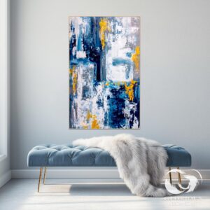 Detail shot of blue and gold abstract art, highlighting textured brushstrokes