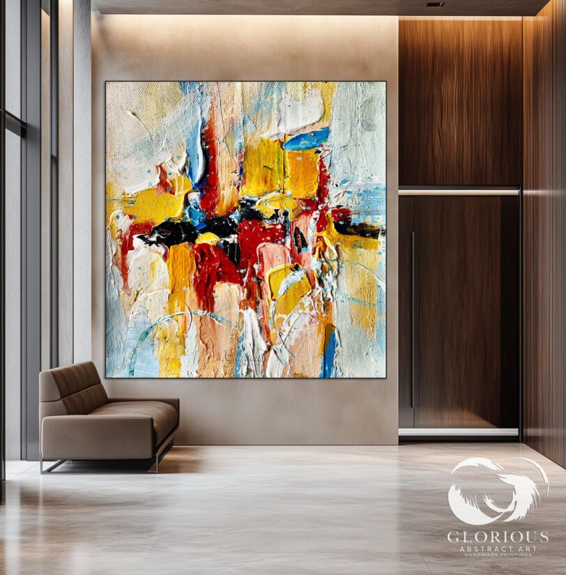 Detail of layered textures and bold colors on an abstract canvas