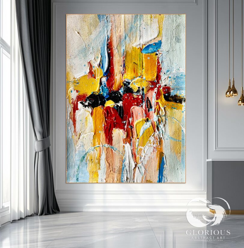 Abstract canvas art with textured brushstrokes in a modern home office