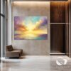 Large abstract canvas with golden sunset hues in a minimalist home office.