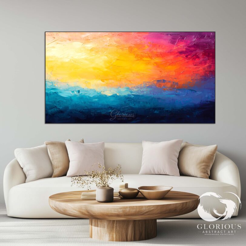 Vibrant abstract painting leaning on a white wall with a minimalist setting