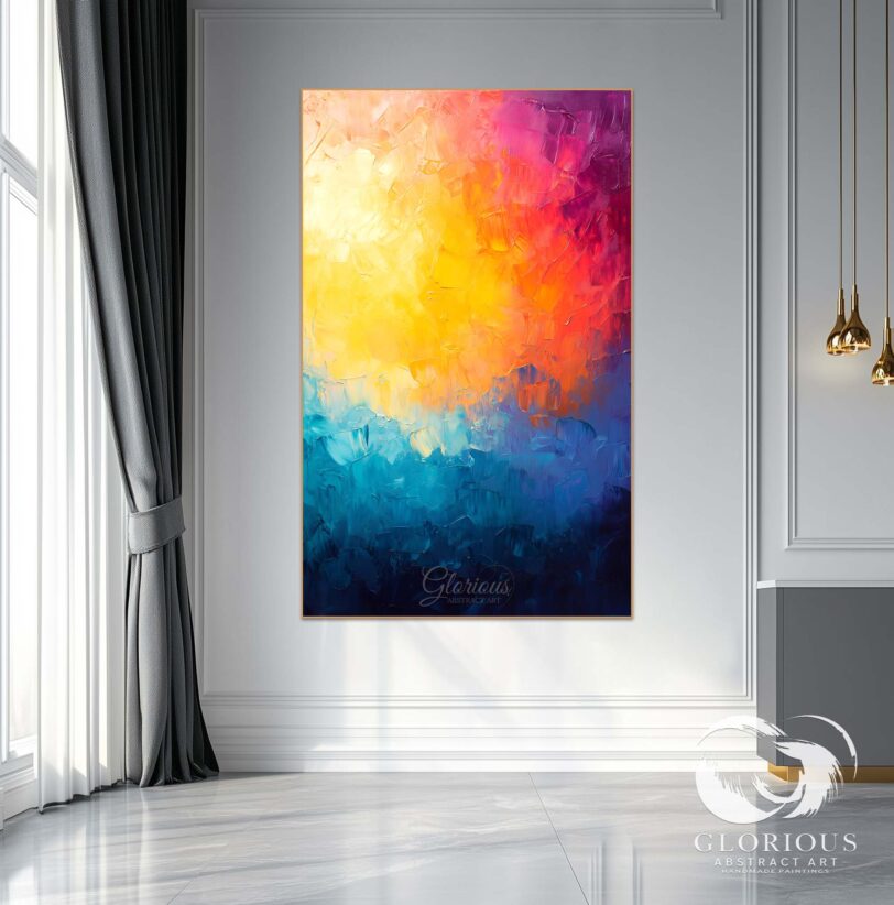 Full view of a yellow, orange, and blue abstract painting on a large canvas