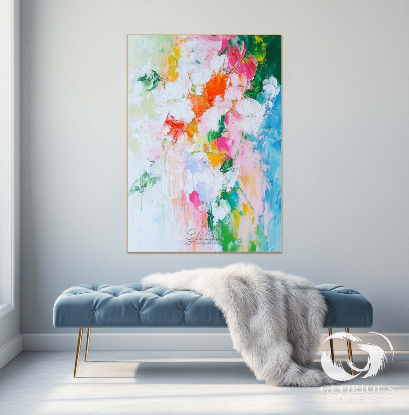 Close-up of textured brushstrokes on a colorful abstract canvas.