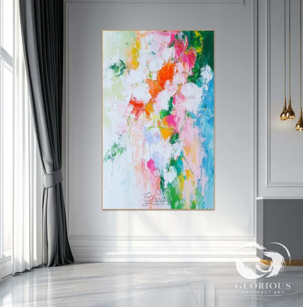 Colorful abstract painting displayed on a black accent wall.