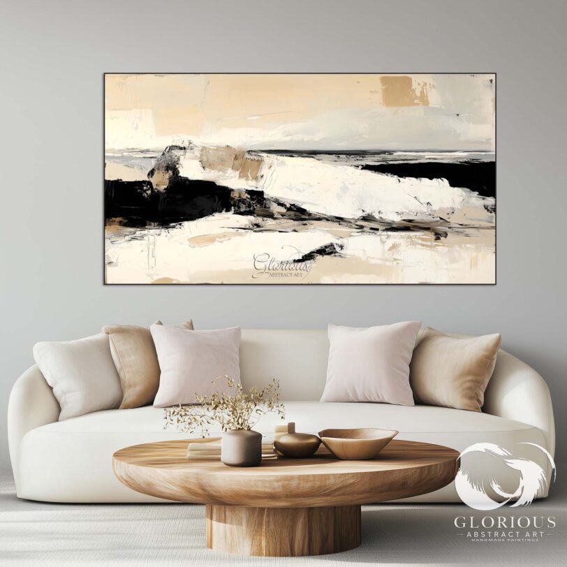 Modern abstract painting in beige and black, styled on a gallery wall with other minimalist decor pieces.