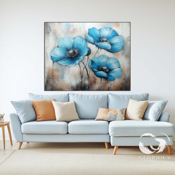 Three vibrant blue abstract flowers painted with soft and bold strokes, creating a dynamic visual appeal.