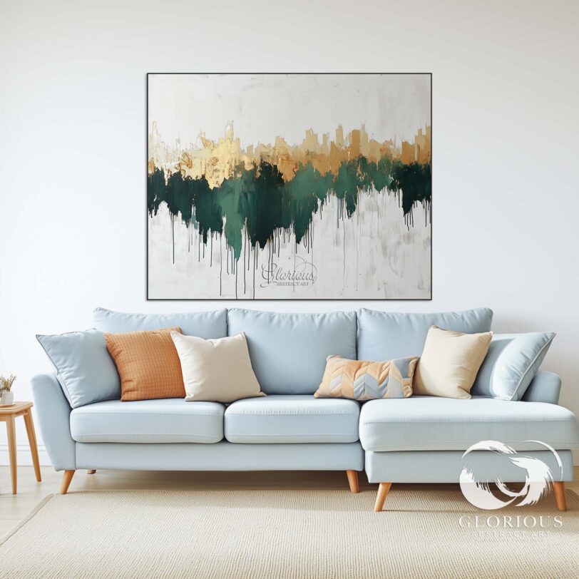 Close-up of textured gold accents on a green abstract canvas.